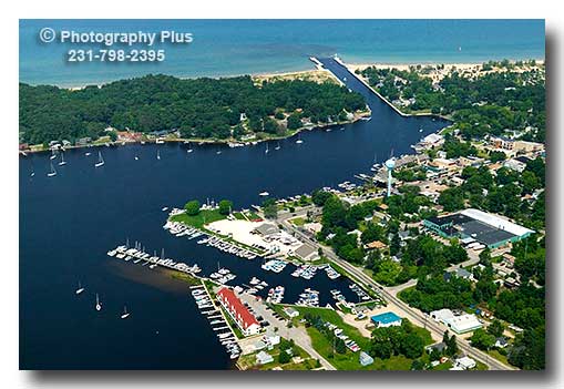 Aerial photo of Pentwater, Michigan with Snug Harbor, Charlie's Marine 