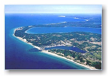 High aerial view of Frankfort north to Point Betsie