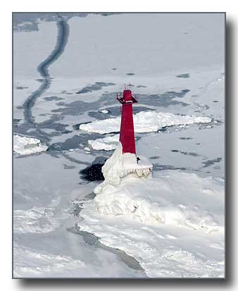 Icy Muskegon Lighthouse aerial view