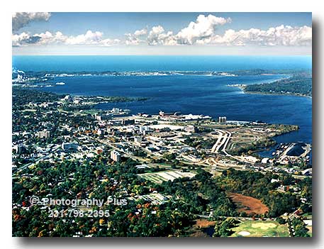 An aerial photo of downtown Muskegon looking out over Muskegon Lake to ...