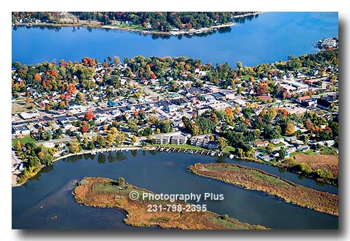 Aerial photo of the town of Spring Lake, Michigan in the fall looking